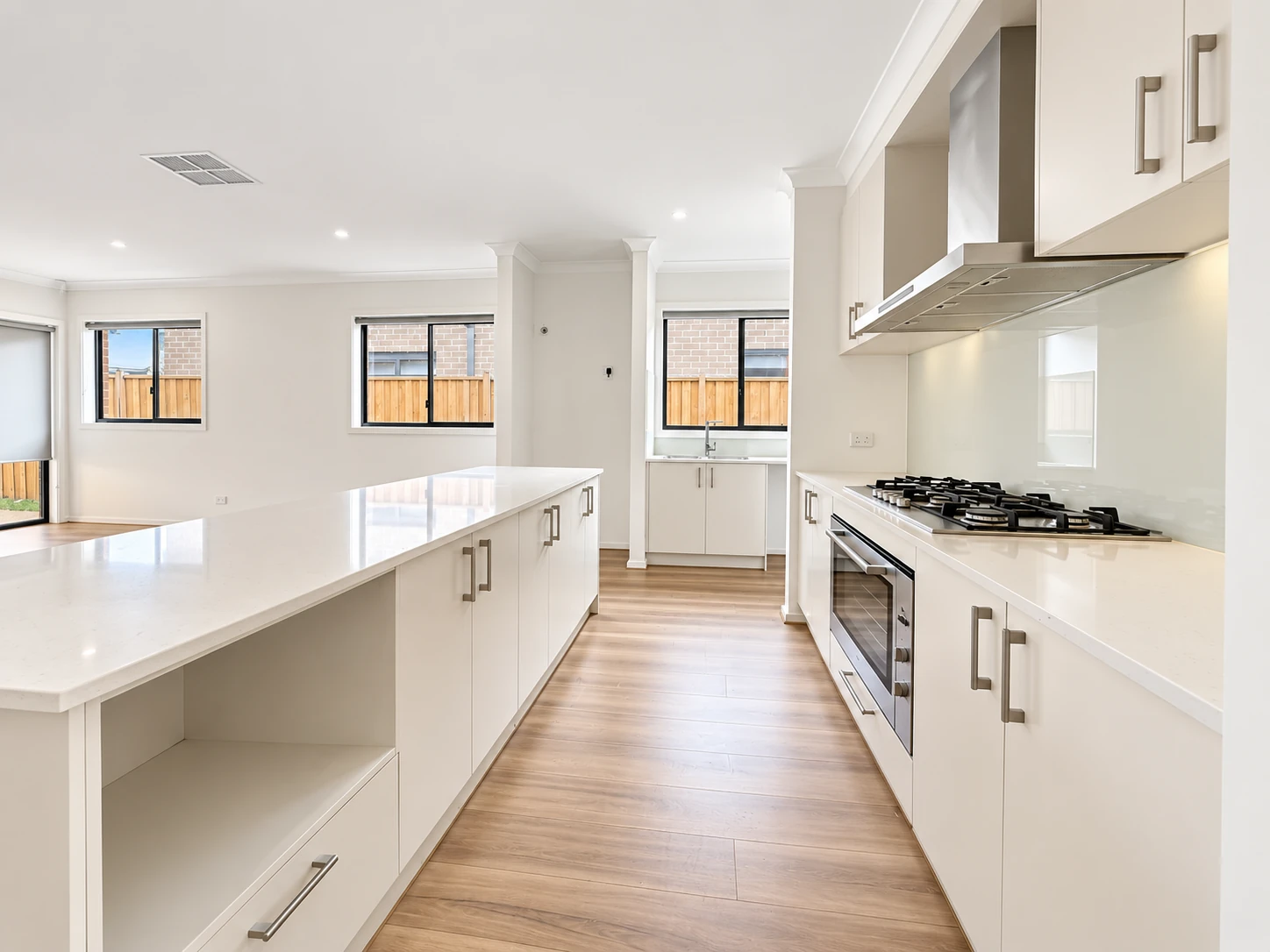 Bright modern kitchen and open-plan living space